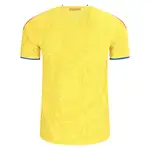 Back of yellow Colombia soccer jersey with butterfly pattern.