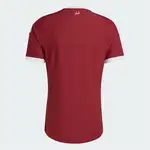 Back of maroon Adidas jersey with white trim and قطر text.