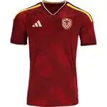 Maroon soccer jersey with geometric pattern, Adidas logo, and team crest.