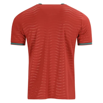 Back of a red t-shirt with wavy lines.