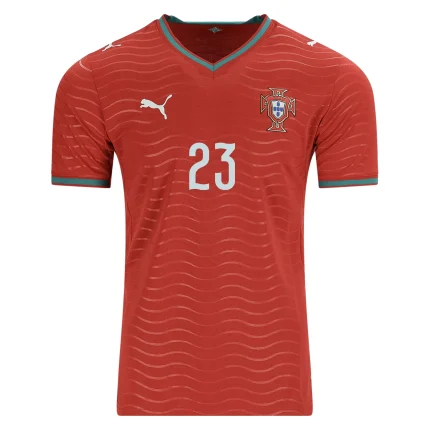 Red soccer jersey with number 23, Puma logo, and Portugal crest.