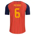 Spain soccer jersey with MERINO and number 6 on the back.